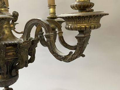 Bronze chandelier with eight lights.

Regency...