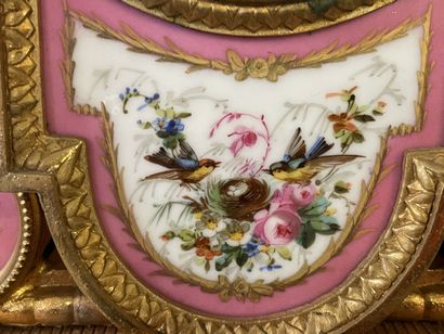 Gilt bronze and porcelain plate mantelpiece....