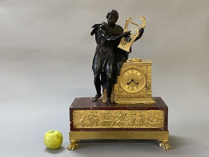 Antique poet clock, in patinated bronze and...