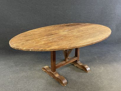 Oval dining room table type vigneronne, with...