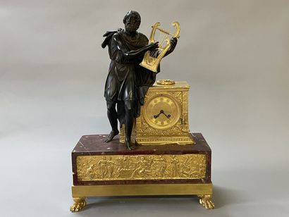 Antique poet clock, in patinated bronze and...