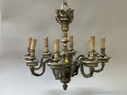 Bronze chandelier with eight lights.

Regency...