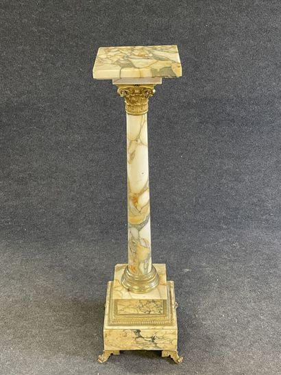 Marble and bronze column with swivel top....