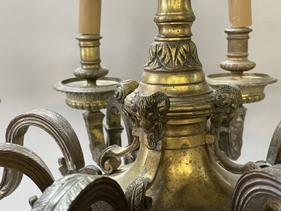 Bronze chandelier with eight lights.

Regency...