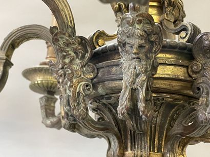 Bronze chandelier with eight lights.

Regency...