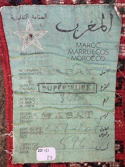 Large Moroccan carpet red background.

287...