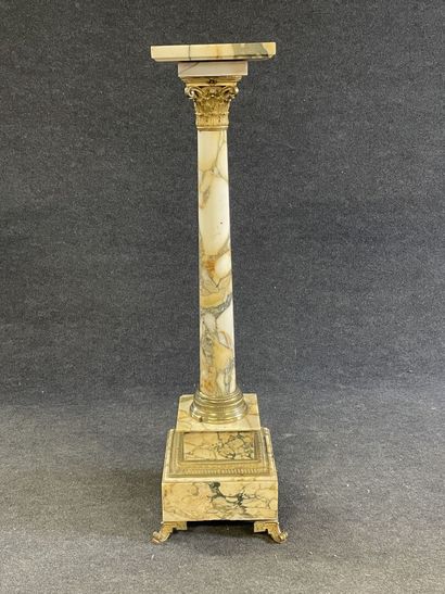 Marble and bronze column with swivel top....