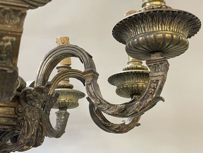 Bronze chandelier with eight lights.

Regency...