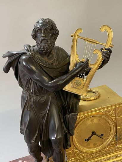 Antique poet clock, in patinated bronze and...