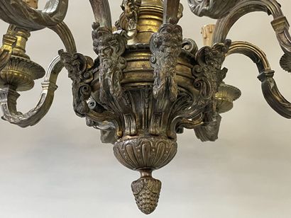 Bronze chandelier with eight lights.

Regency...