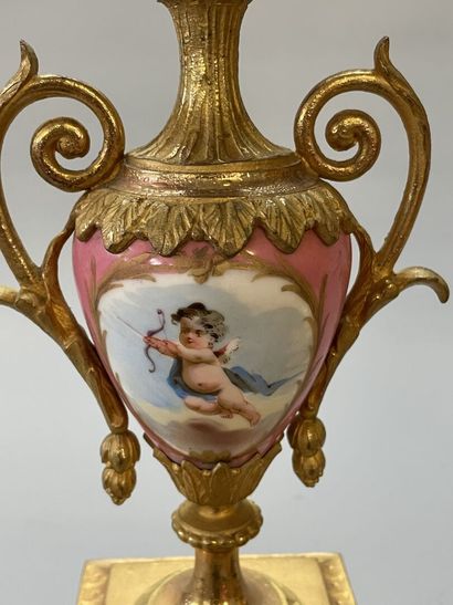 Gilt bronze and porcelain plate mantelpiece....