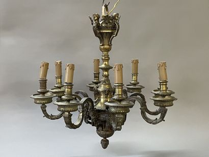 Bronze chandelier with eight lights.

Regency...