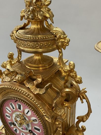 Gilt bronze and porcelain plate mantelpiece....