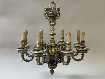 Bronze chandelier with eight lights.

Regency...
