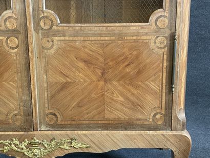 Walnut frieze display case, opening with...