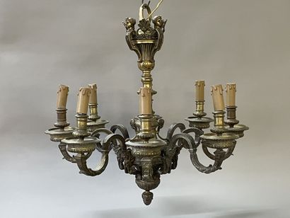 Bronze chandelier with eight lights.

Regency...