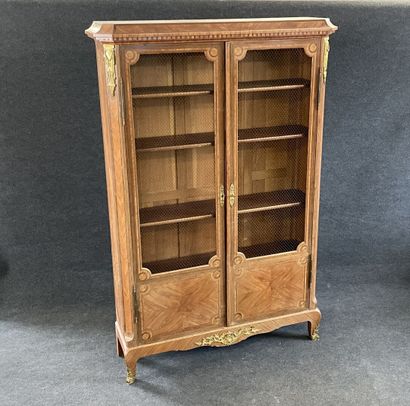 Walnut frieze display case, opening with...