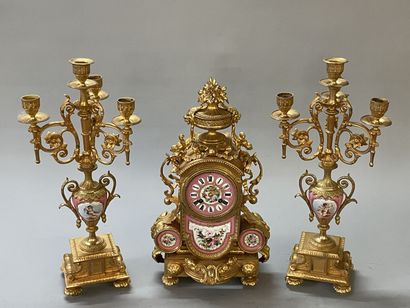 Gilt bronze and porcelain plate mantelpiece....