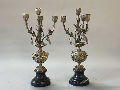Pair of gilt bronze candelabras representing...