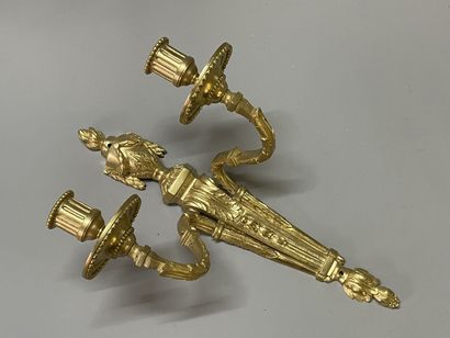 Pair of bronze sconces with two lights.
Louis...