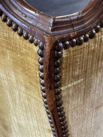 Armchair with ears in carved wood.
Louis...
