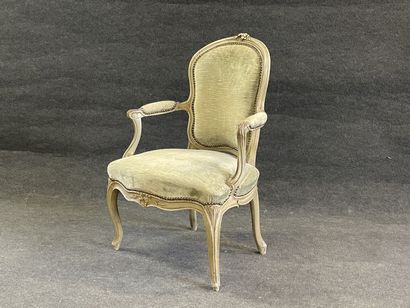 Carved and lacquered wood cabriolet armchair.
Stamped...