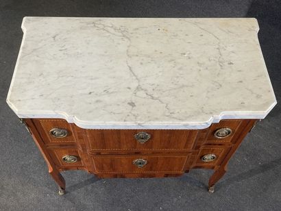 Inlaid chest of drawers, with central projection,...
