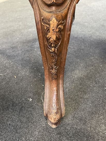 Armchair with ears in carved wood.
Louis...