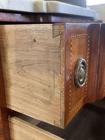 Inlaid chest of drawers, with central projection,...