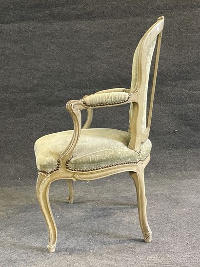 Carved and lacquered wood cabriolet armchair.
Stamped...