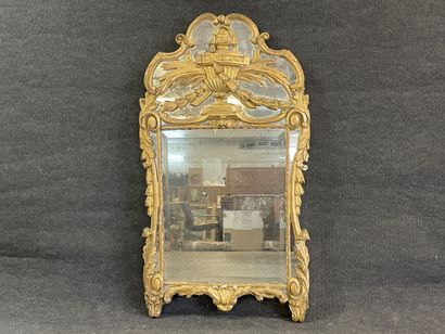 Wood and gilded stucco mirror, pediment showing...