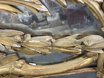 Wood and gilded stucco mirror, pediment showing...