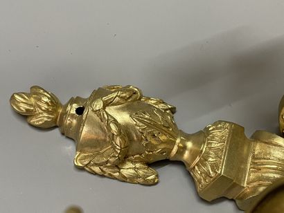 Pair of bronze sconces with two lights.
Louis...