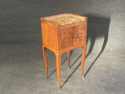 Table inlaid with flowers and frieze, top...