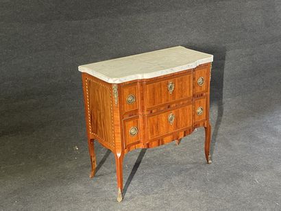 Inlaid chest of drawers, with central projection,...