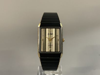 CARTIER. Must
Rare montre à quartz en argent,...