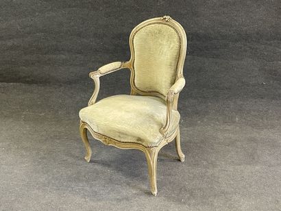 Carved and lacquered wood cabriolet armchair.
Stamped...