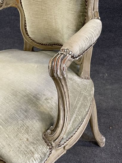 Carved and lacquered wood cabriolet armchair.
Stamped...