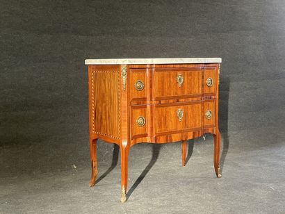 Inlaid chest of drawers, with central projection,...