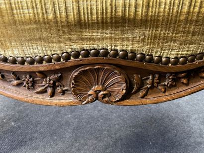 Armchair with ears in carved wood.
Louis...