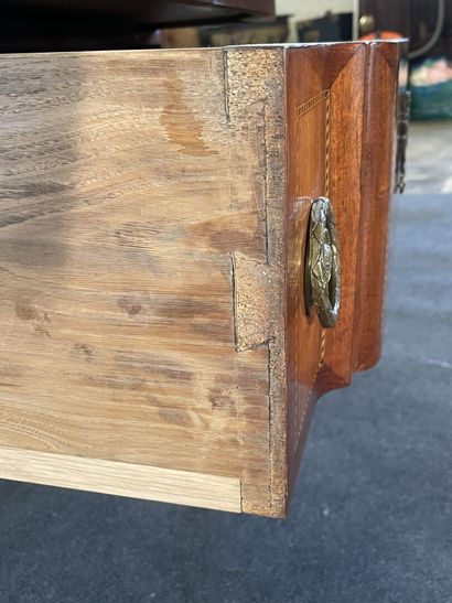 Inlaid chest of drawers, with central projection,...