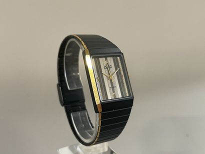 CARTIER. Must
Rare montre à quartz en argent,...
