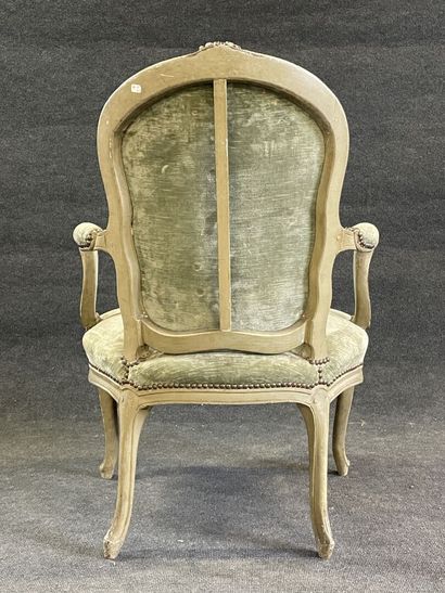Carved and lacquered wood cabriolet armchair.
Stamped...