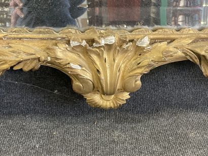 Wood and gilded stucco mirror, pediment showing...