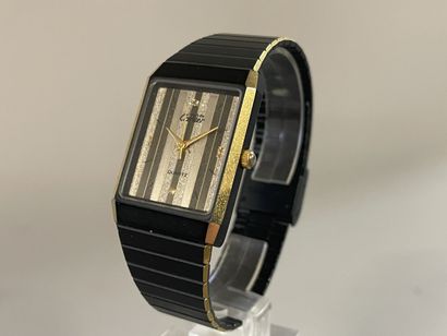CARTIER. Must
Rare montre à quartz en argent,...