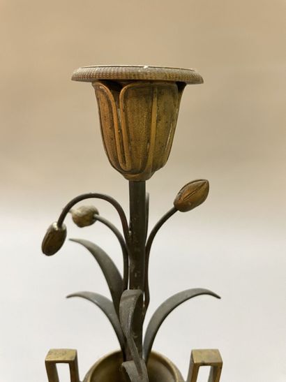 Pair of candlesticks in gilded and patinated...