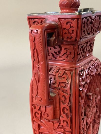 Carved lacquer jug on a wooden base. 
H....