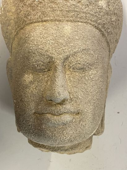 Carved sandstone Buddha head
H. 27 cm. 
