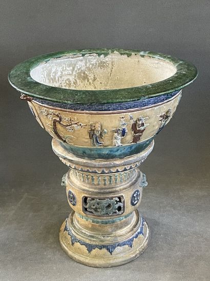 Large ceramic basin of round form, resting...
