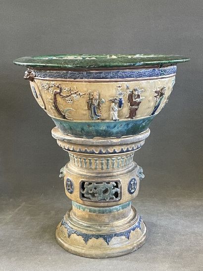 Large ceramic basin of round form, resting...